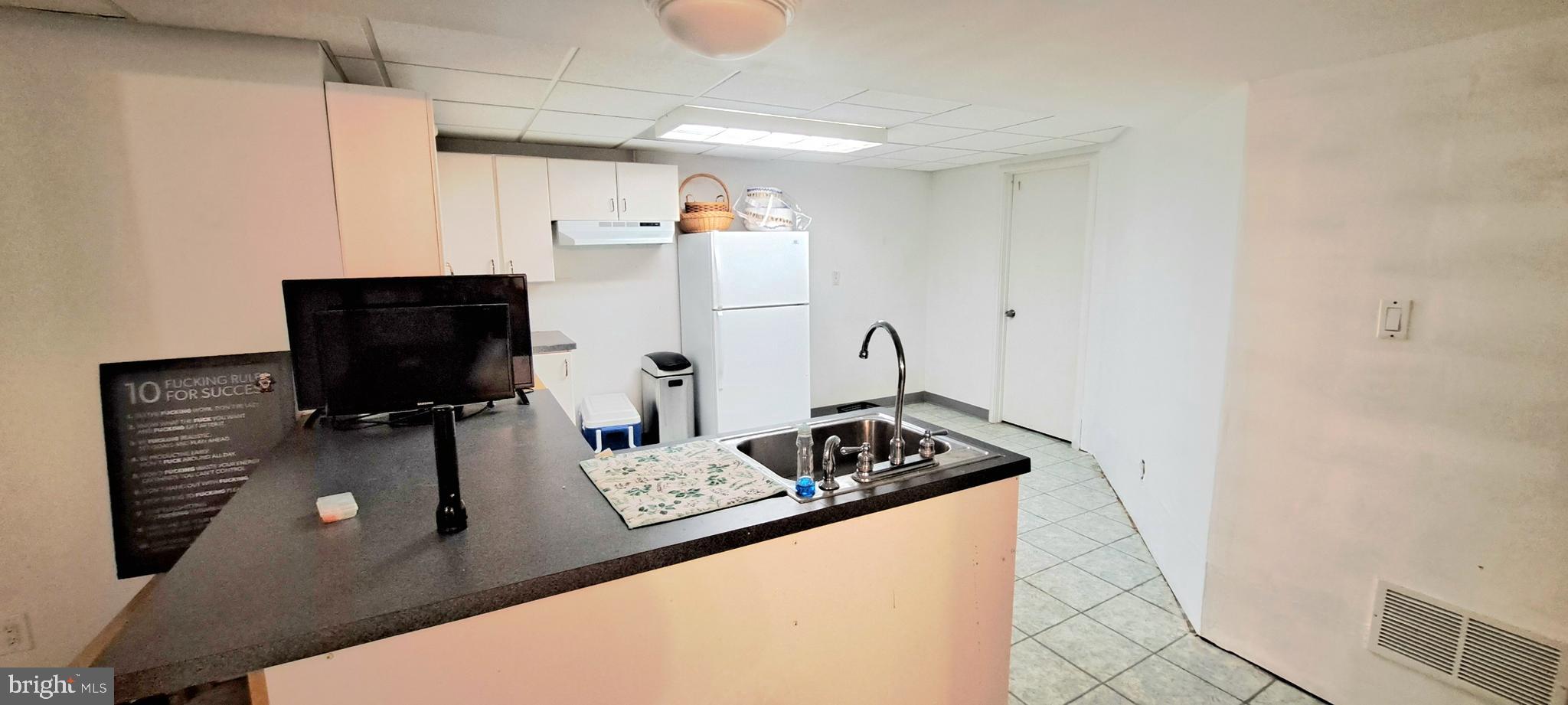 246 Main Avenue Milmay, NJ 08340 - Photo 32 of 47 FINISHED BASEMENT KITCHEN AREA