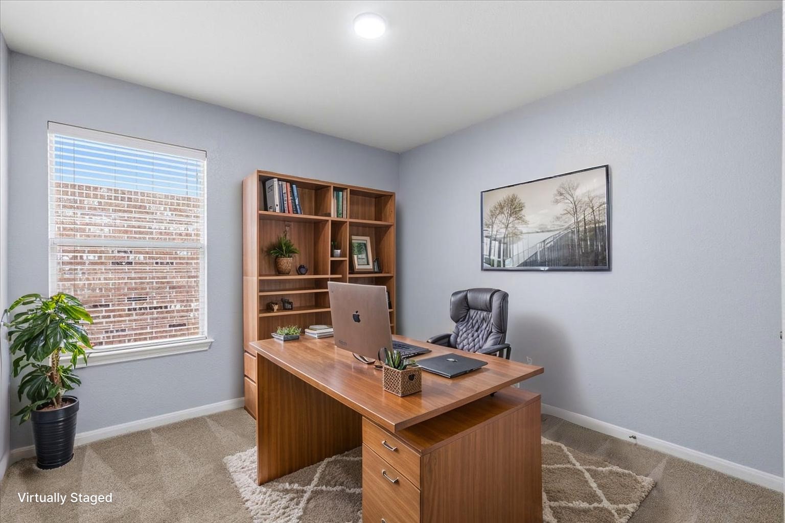 17812 Masi Loop Pflugerville, TX 78660 - Photo 25 of 38 Virtually Staged Spacious room with a neutral carpet, light blue walls, and a recessed ceiling light