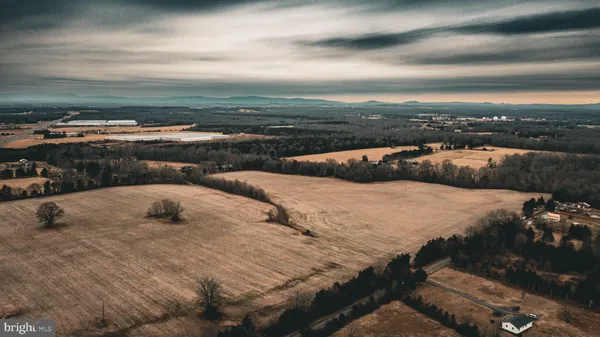 a view of swimming pool with furniture