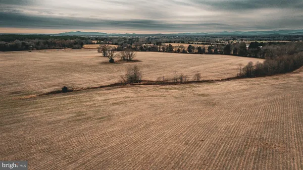 a view of outdoor space with deck and yard