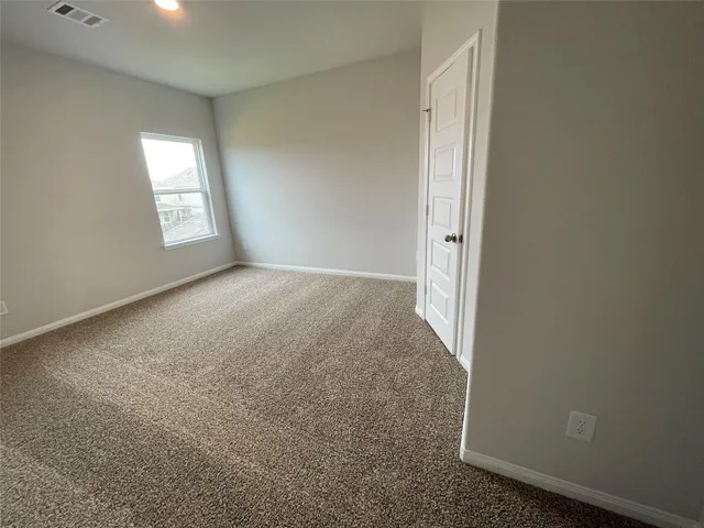 a bathroom with a toilet and a bathtub