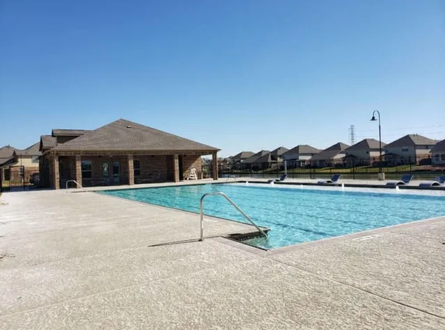 a view of a house with a swimming pool