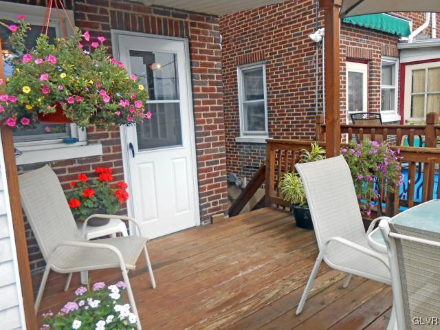 725 Spring Street Bethlehem, PA 18018 - Photo 16 of 21 a view of a dining room with furniture and flowers