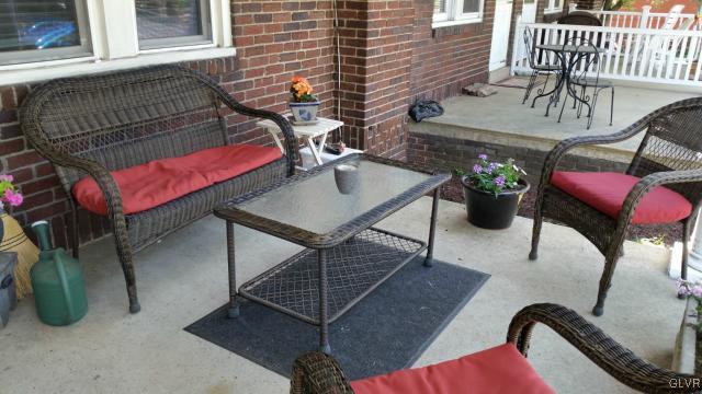 725 Spring Street Bethlehem, PA 18018 - Photo 2 of 21 a view of a patio with couches chairs and potted plants