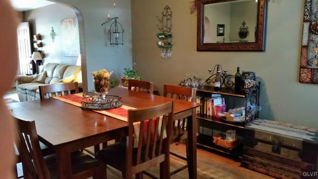 725 Spring Street Bethlehem, PA 18018 - Photo 5 of 21 a view of a dining room with furniture and wooden floor