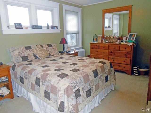 725 Spring Street Bethlehem, PA 18018 - Photo 10 of 21 a bedroom with a bed and window