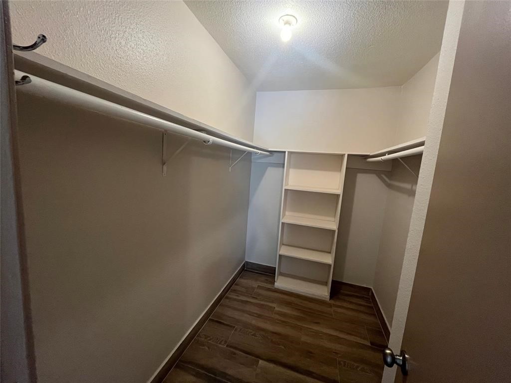 1516 Bay Area Boulevard, Unit 14 Houston, TX 77058 - Photo 17 of 19 a view of an empty walk in closet