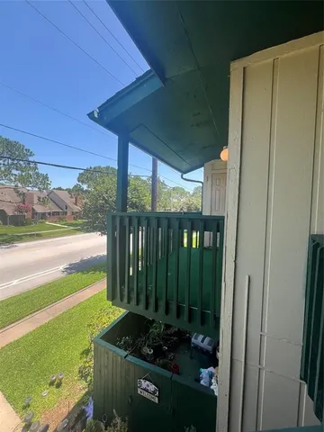 a view of backyard with tub and outdoor space