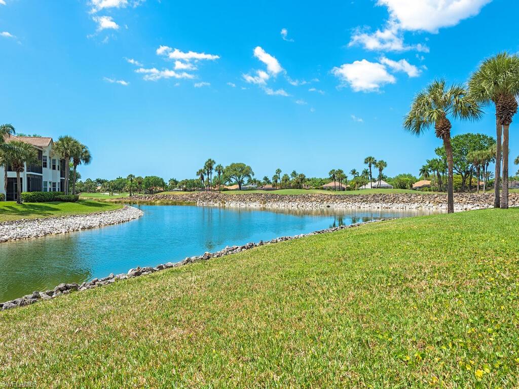 4415 Dover Court, Unit 504 Naples, FL 34105 - Photo 14 of 21 a view of a lake with a big yard