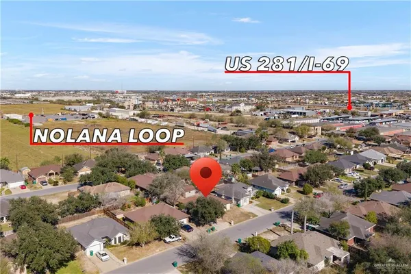 an outdoor space with lots of green space and garden view