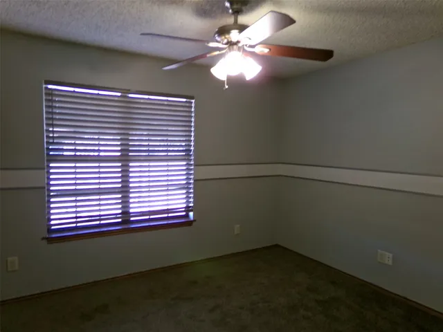 a view of a livingroom with a fan