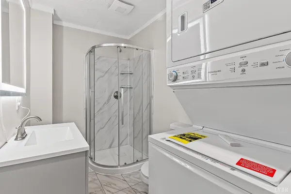 a bathroom with a sink and a shower
