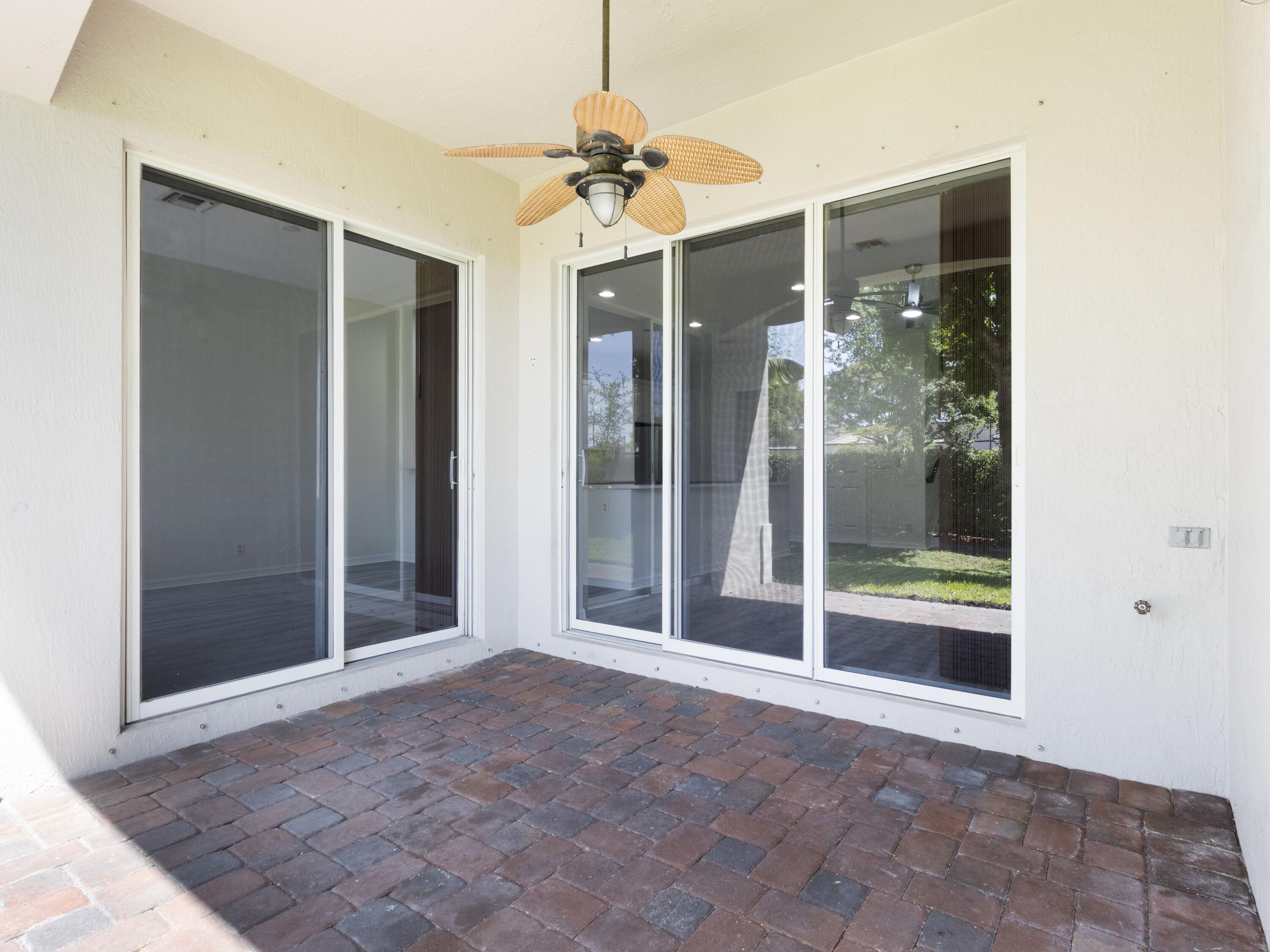 64 Lancaster Road Boynton Beach, FL 33426 - Photo 32 of 50 Rear Covered Patio