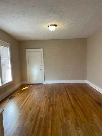 a bathroom with a white bathtub