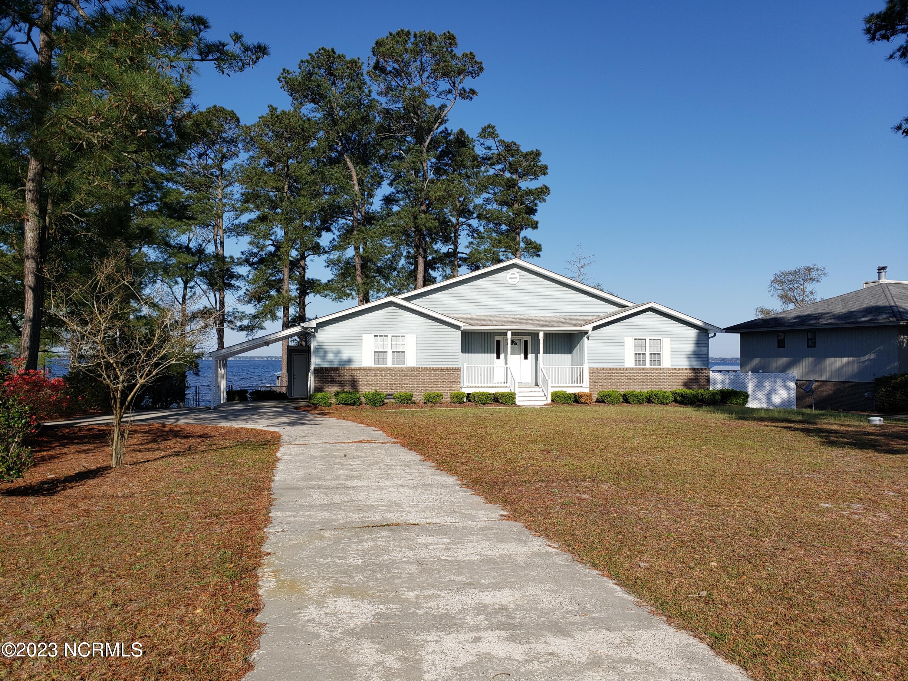 2430 Bella Coola Road Lake Waccamaw, NC 28450 - Photo 2 of 58 street side view
