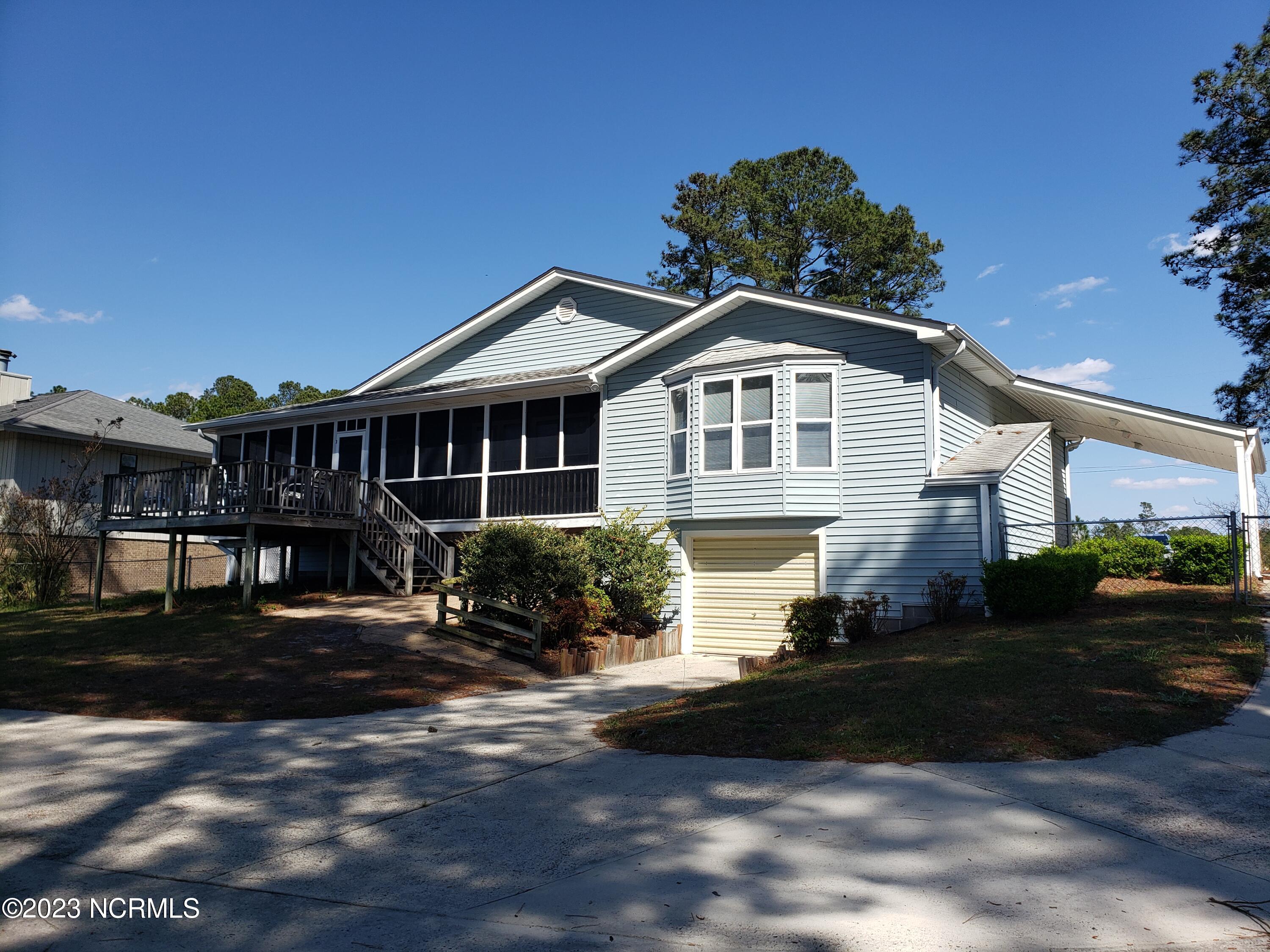 2430 Bella Coola Road Lake Waccamaw, NC 28450 - Photo 3 of 58 lake side view