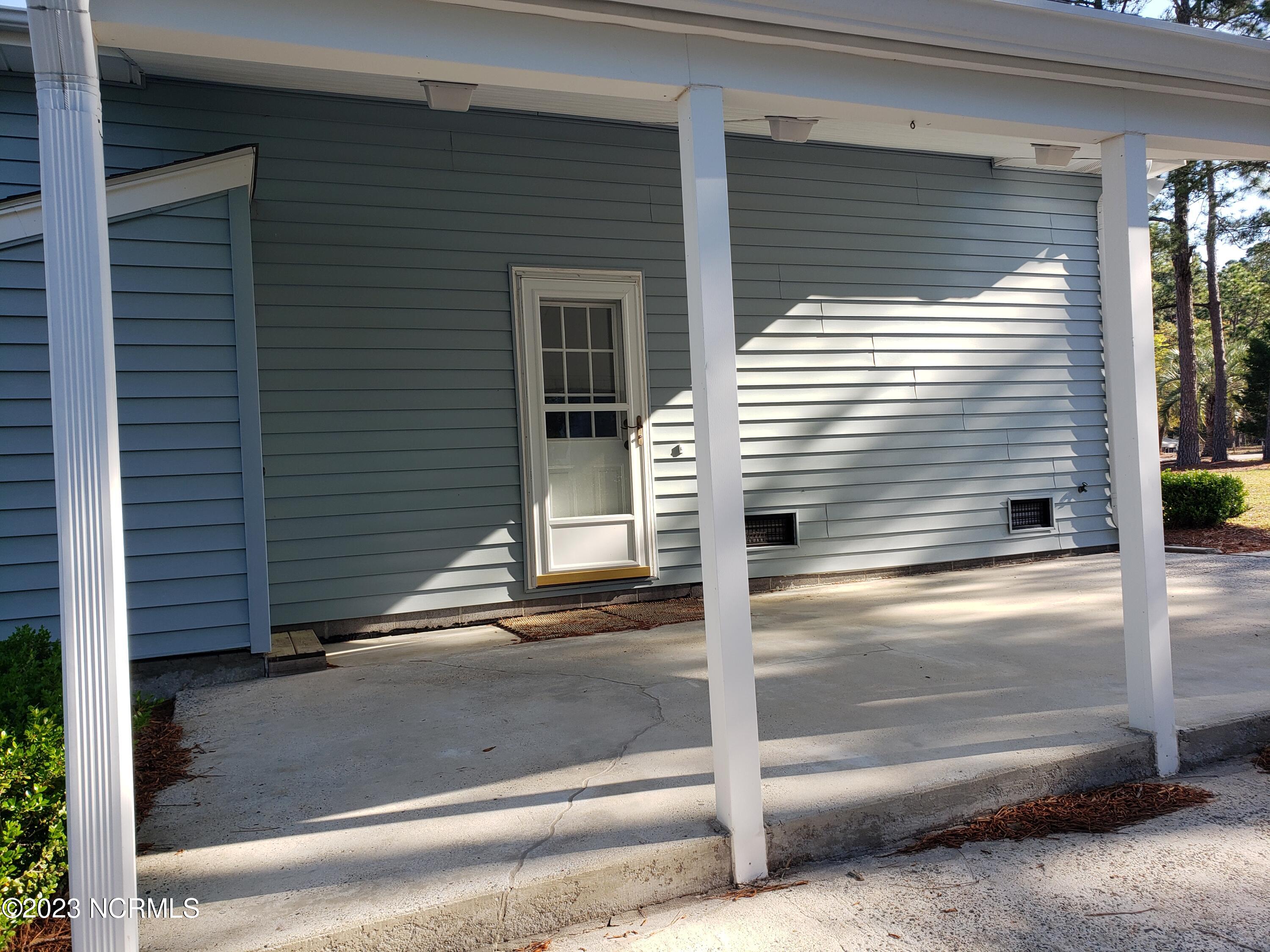 2430 Bella Coola Road Lake Waccamaw, NC 28450 - Photo 8 of 58 20230330_092725