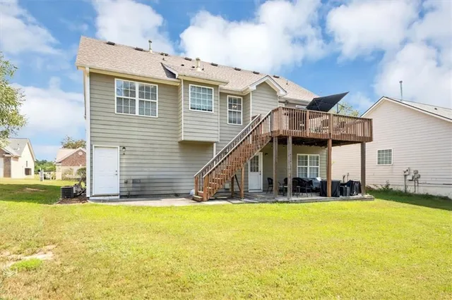 front view of a house with a swimming pool