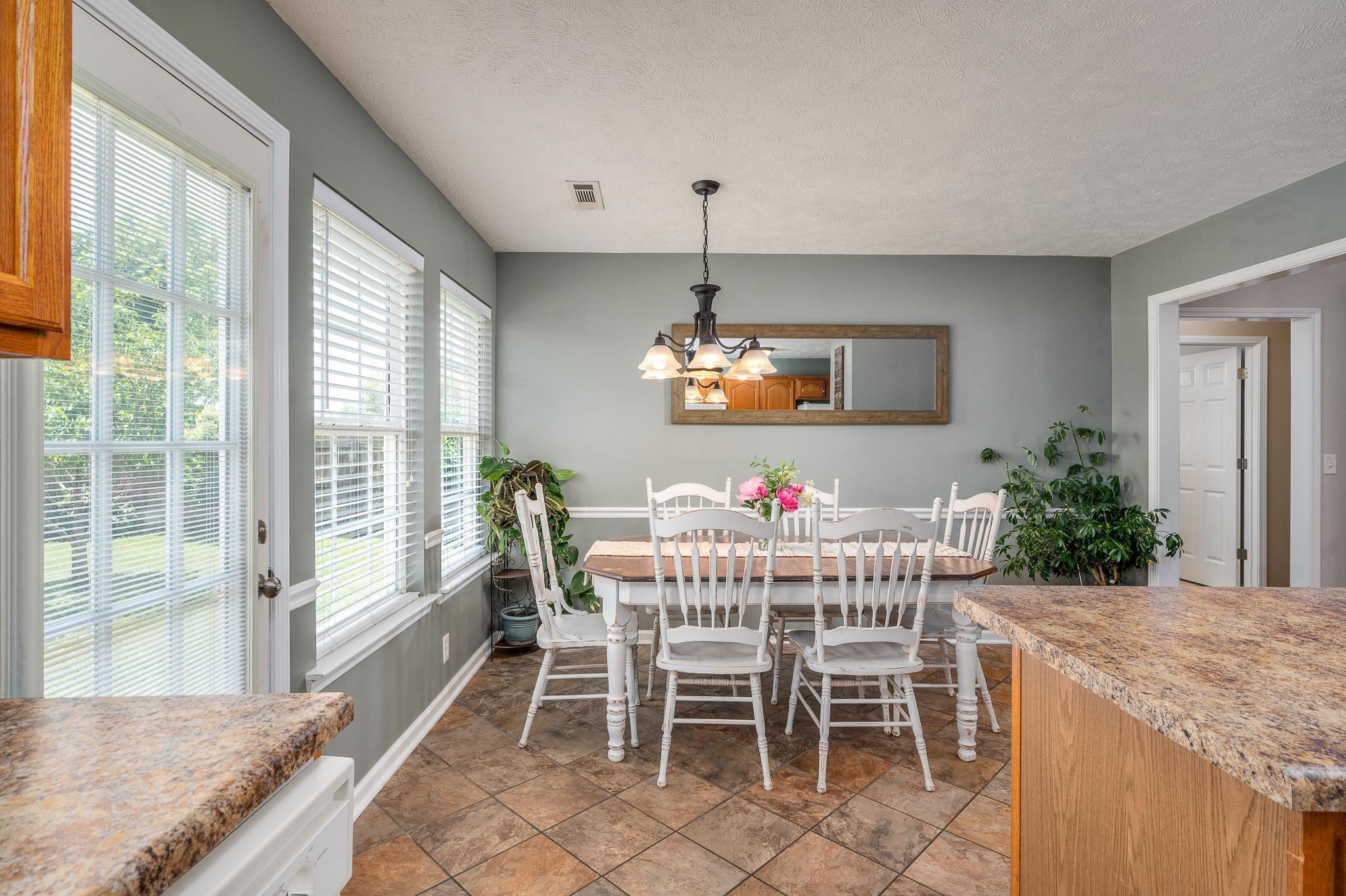 5039 Midland Fosterville Road Bell Buckle, TN 37020 - Photo 12 of 32 a view of a dining room with furniture window and outside view