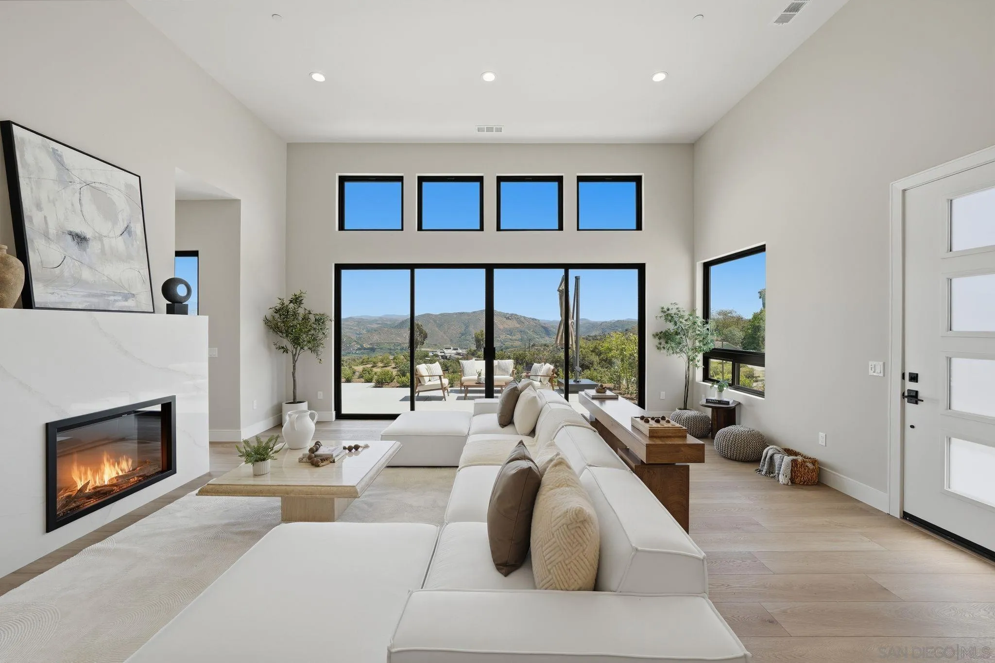 3916 Citrus Drive Fallbrook, CA 92028 - Photo 6 of 72 a living room with furniture and a fireplace