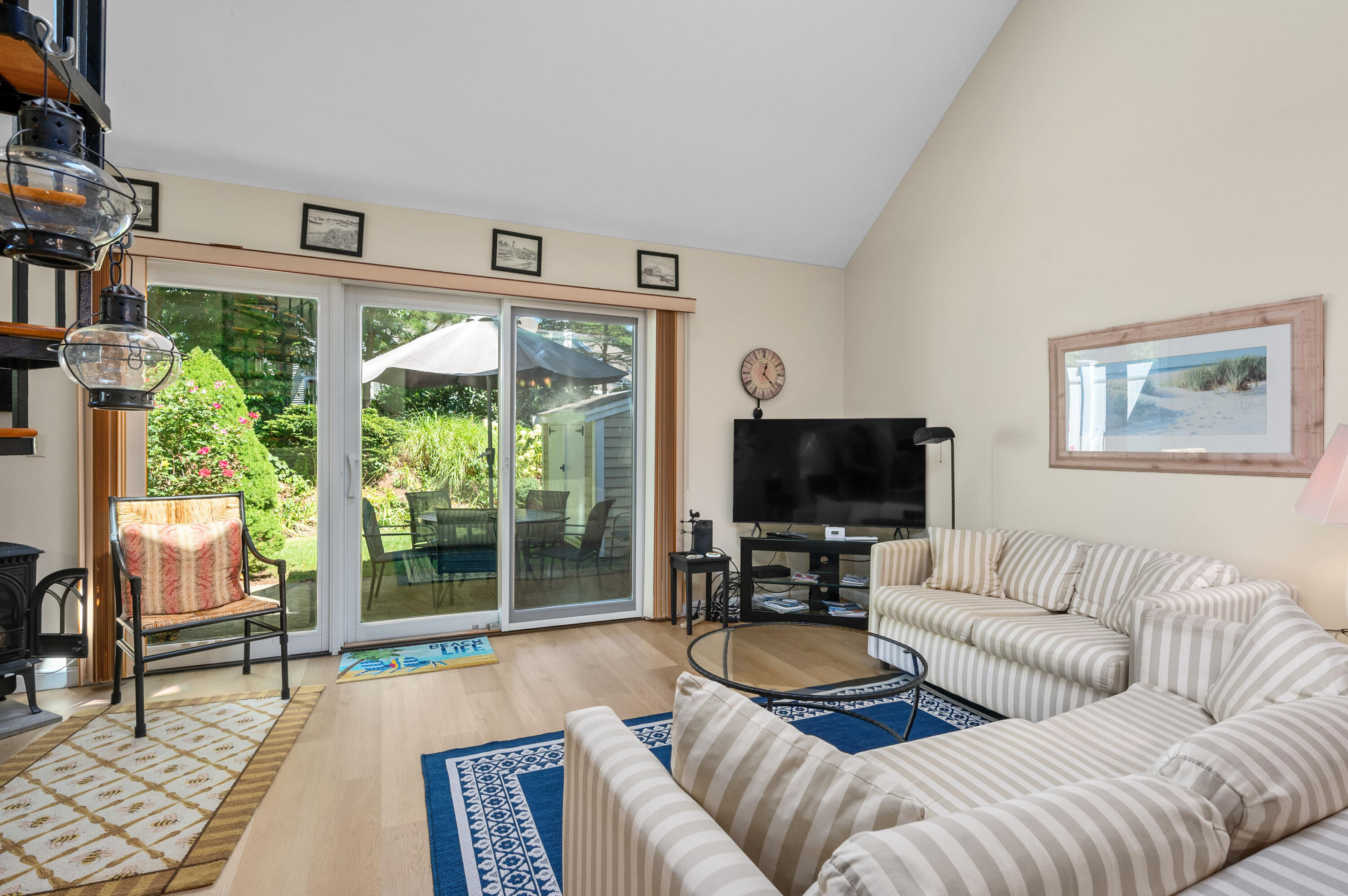 1 Howland Circle Brewster, MA 02631 - Photo 11 of 29 a living room with furniture and a flat screen tv