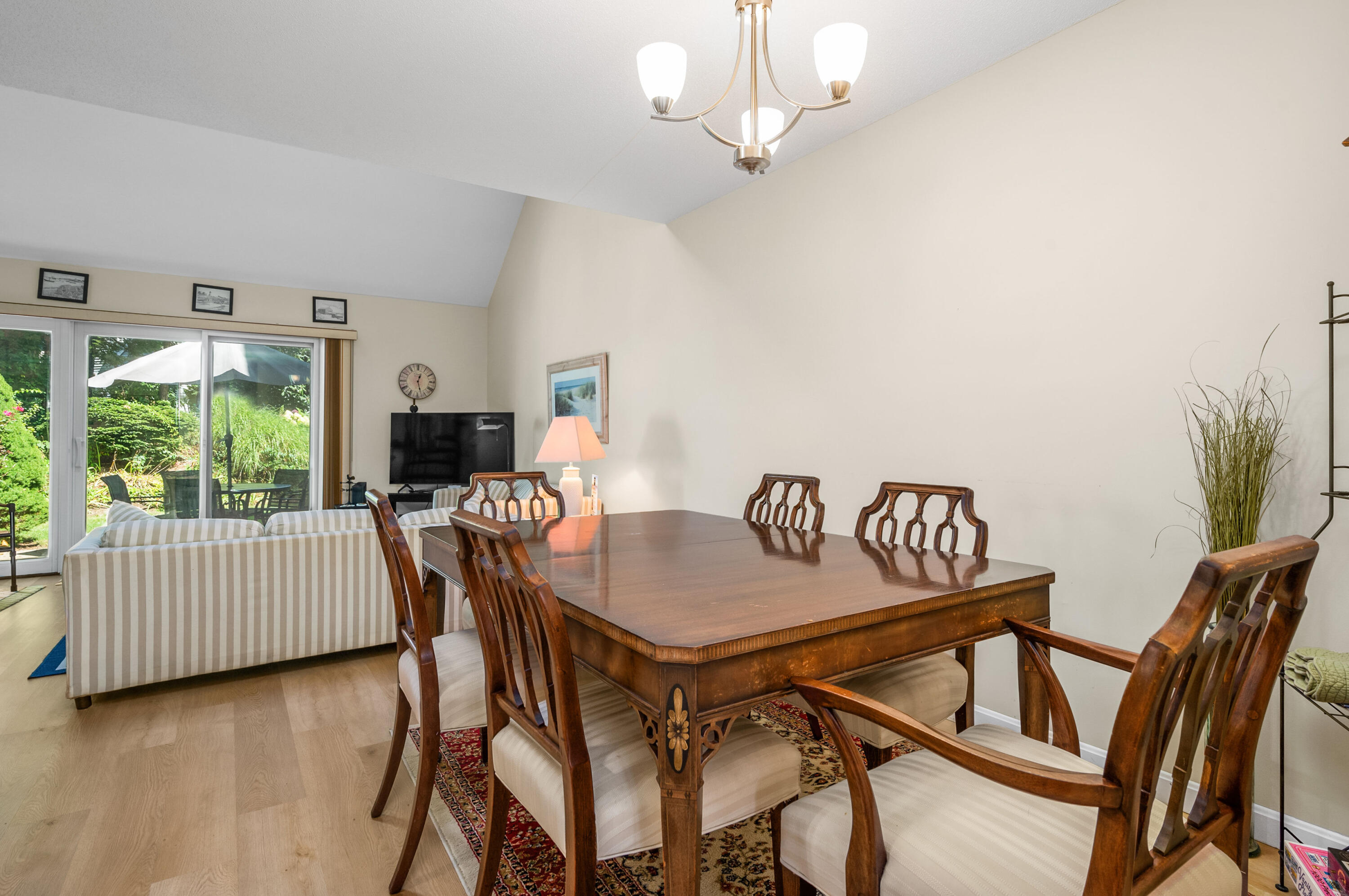1 Howland Circle Brewster, MA 02631 - Photo 16 of 29 a view of a dining room with furniture window and outside view