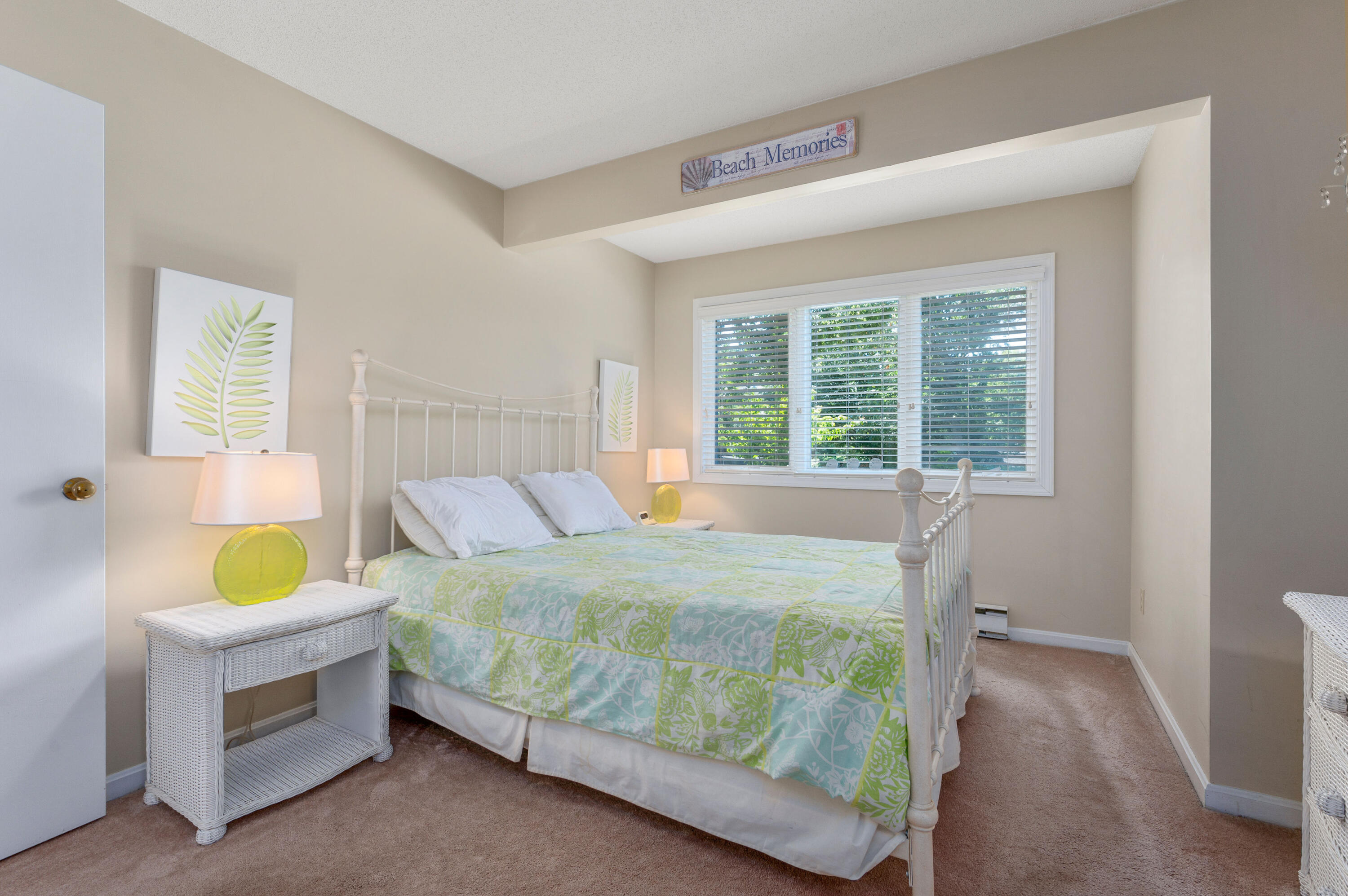 1 Howland Circle Brewster, MA 02631 - Photo 21 of 29 a bed sitting in a bedroom next to a window