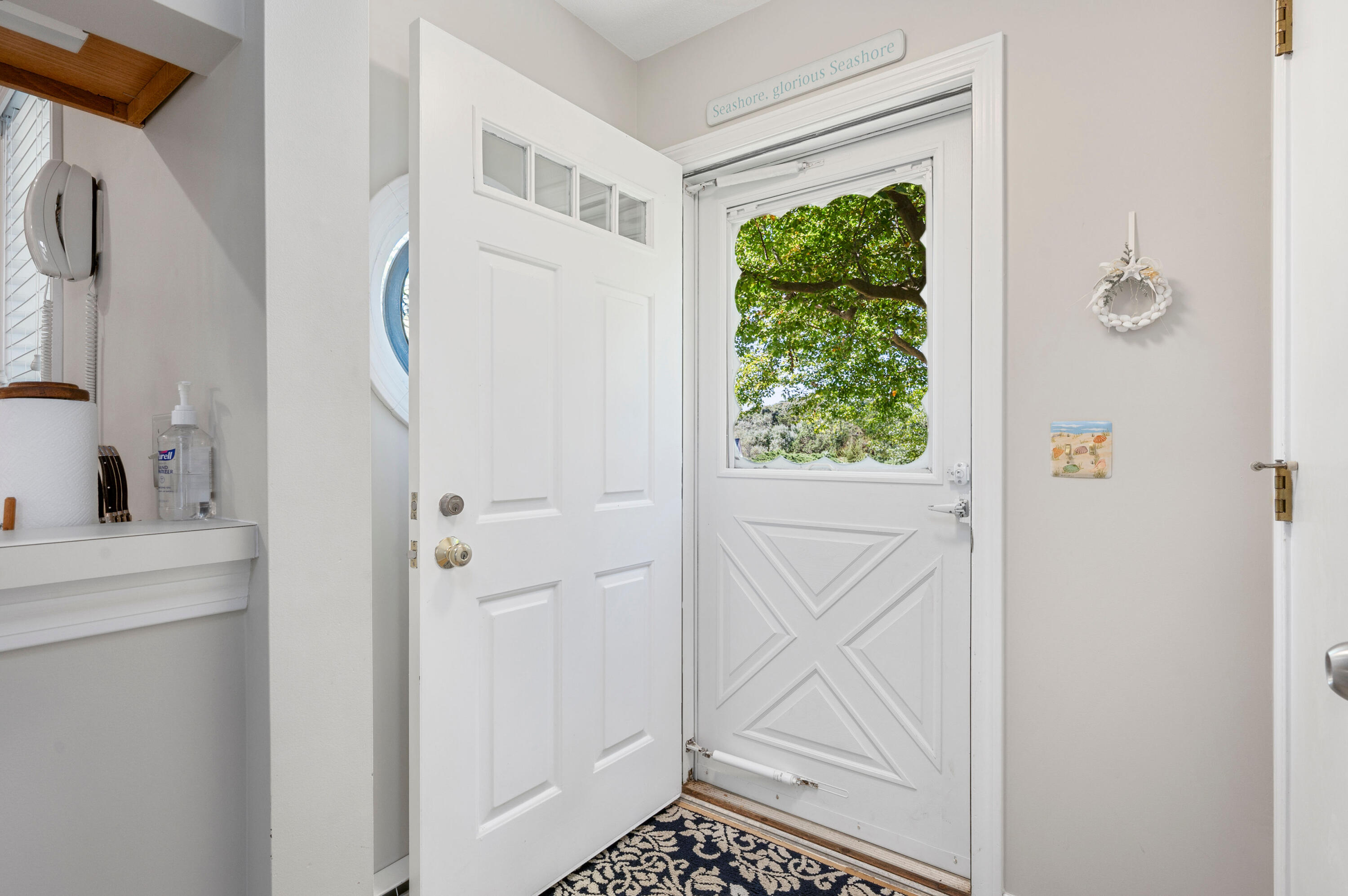1 Howland Circle Brewster, MA 02631 - Photo 4 of 29 a bathroom with a window and a shower