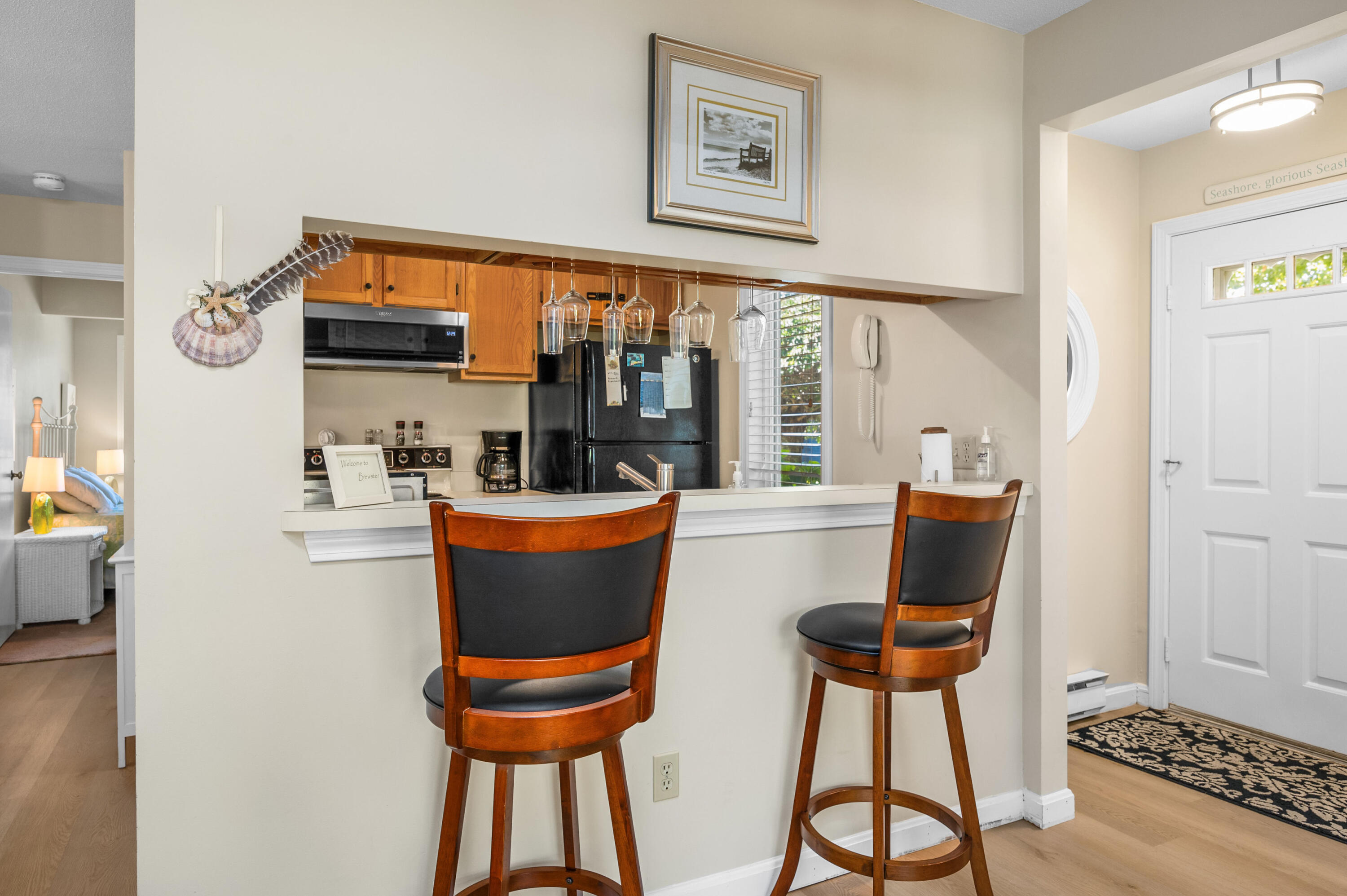 1 Howland Circle Brewster, MA 02631 - Photo 9 of 29 a room with furniture and a window