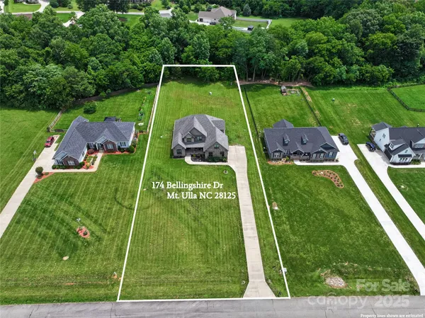 swimming pool view with a big yard