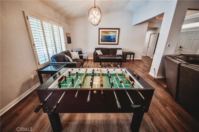 a view of an outdoor sitting area with furniture