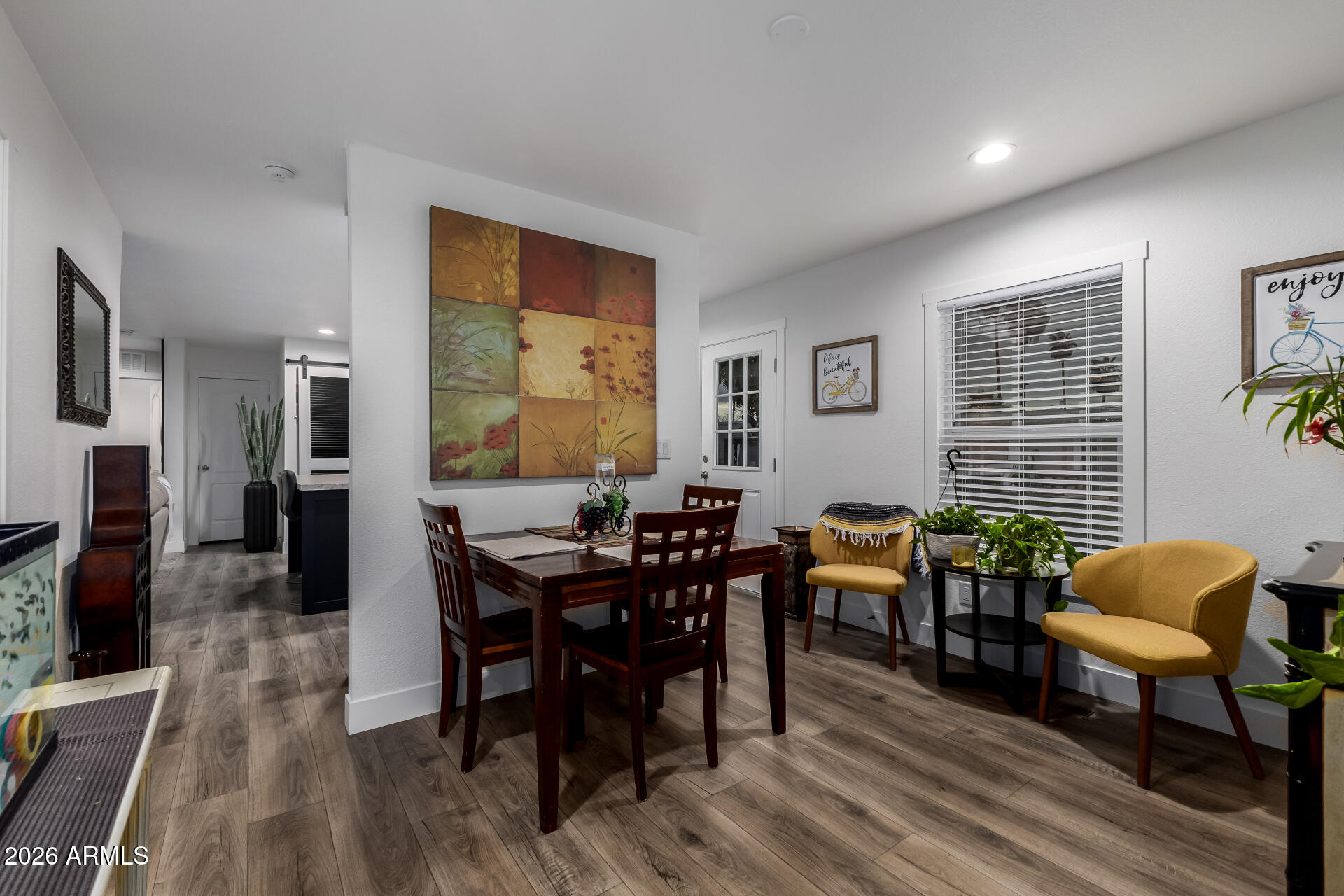 19401 North 7th Street, Unit 73 Phoenix, AZ 85024 - Photo 11 of 30 a view of a livingroom with furniture and wooden floor
