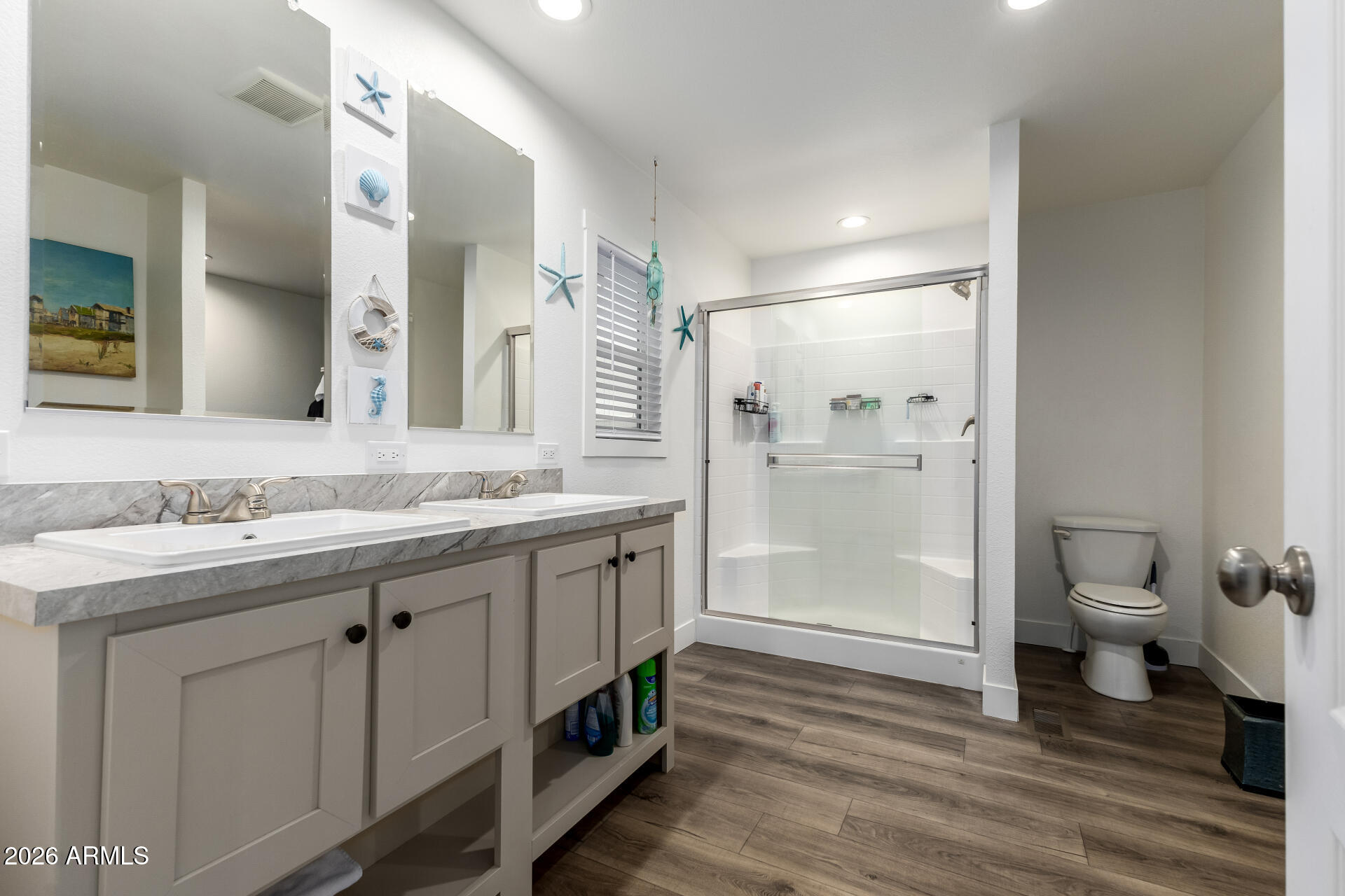 19401 North 7th Street, Unit 73 Phoenix, AZ 85024 - Photo 20 of 30 a bathroom with a sink a toilet and shower