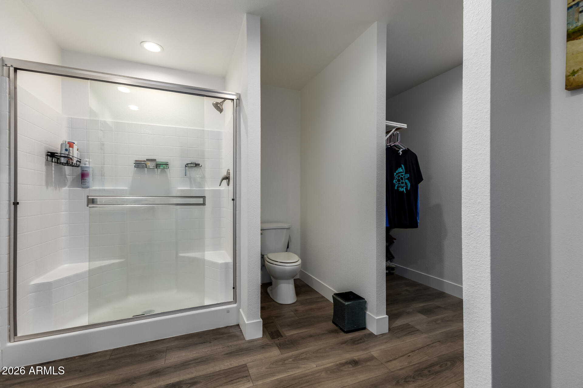 19401 North 7th Street, Unit 73 Phoenix, AZ 85024 - Photo 21 of 30 a bathroom with a glass shower door