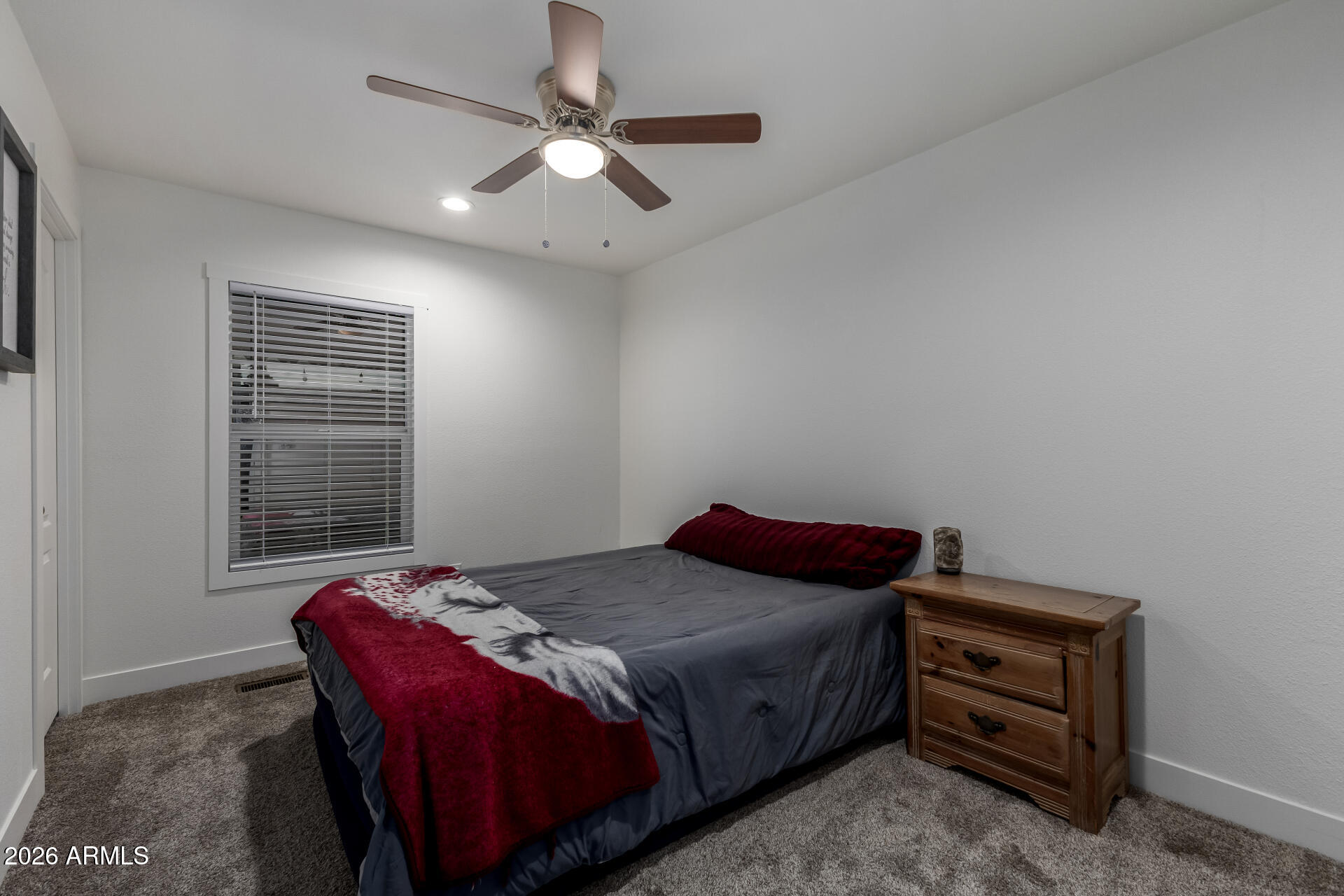 19401 North 7th Street, Unit 73 Phoenix, AZ 85024 - Photo 23 of 30 a bedroom with a bed and a window