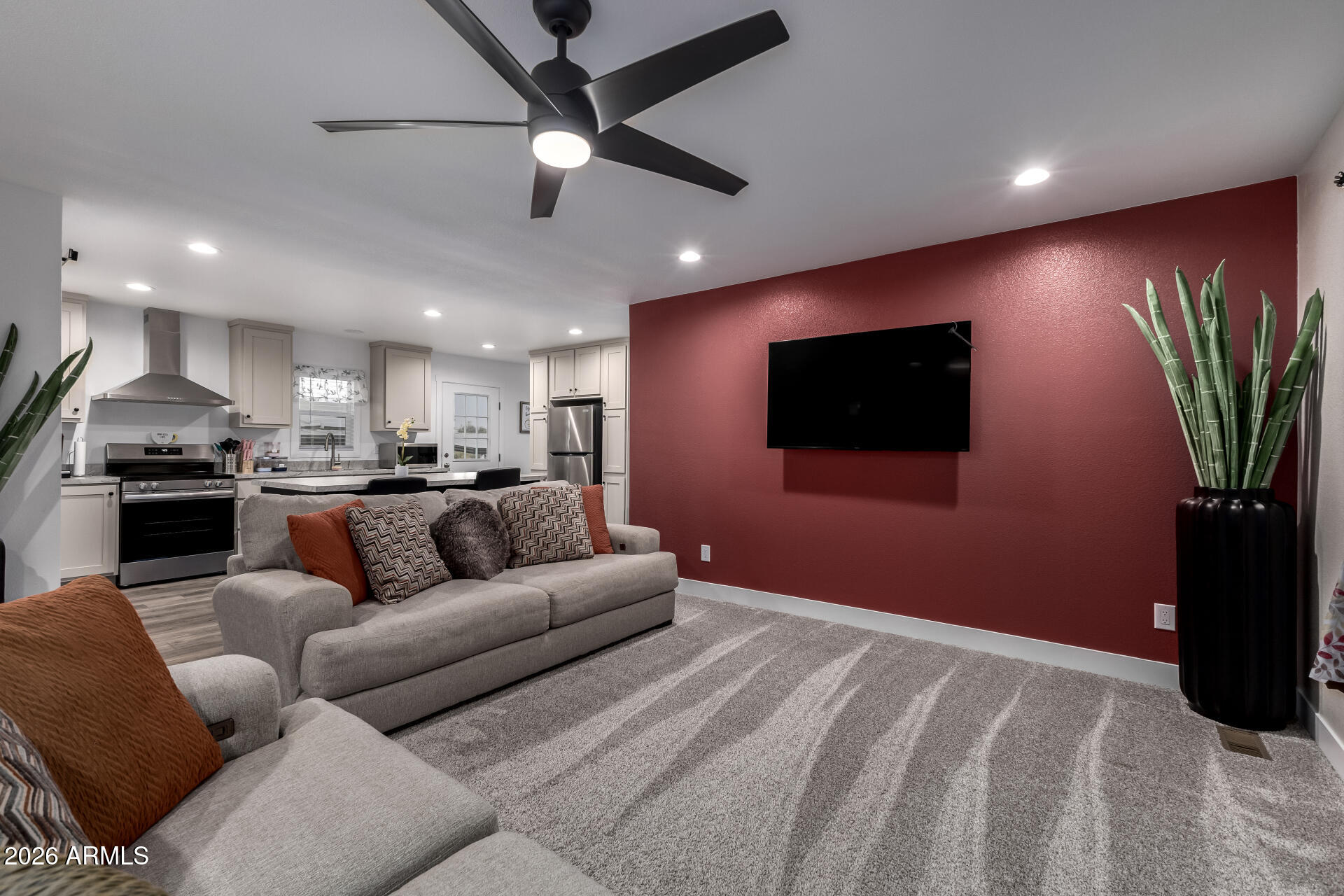 19401 North 7th Street, Unit 73 Phoenix, AZ 85024 - Photo 9 of 30 a living room with furniture and a flat screen tv
