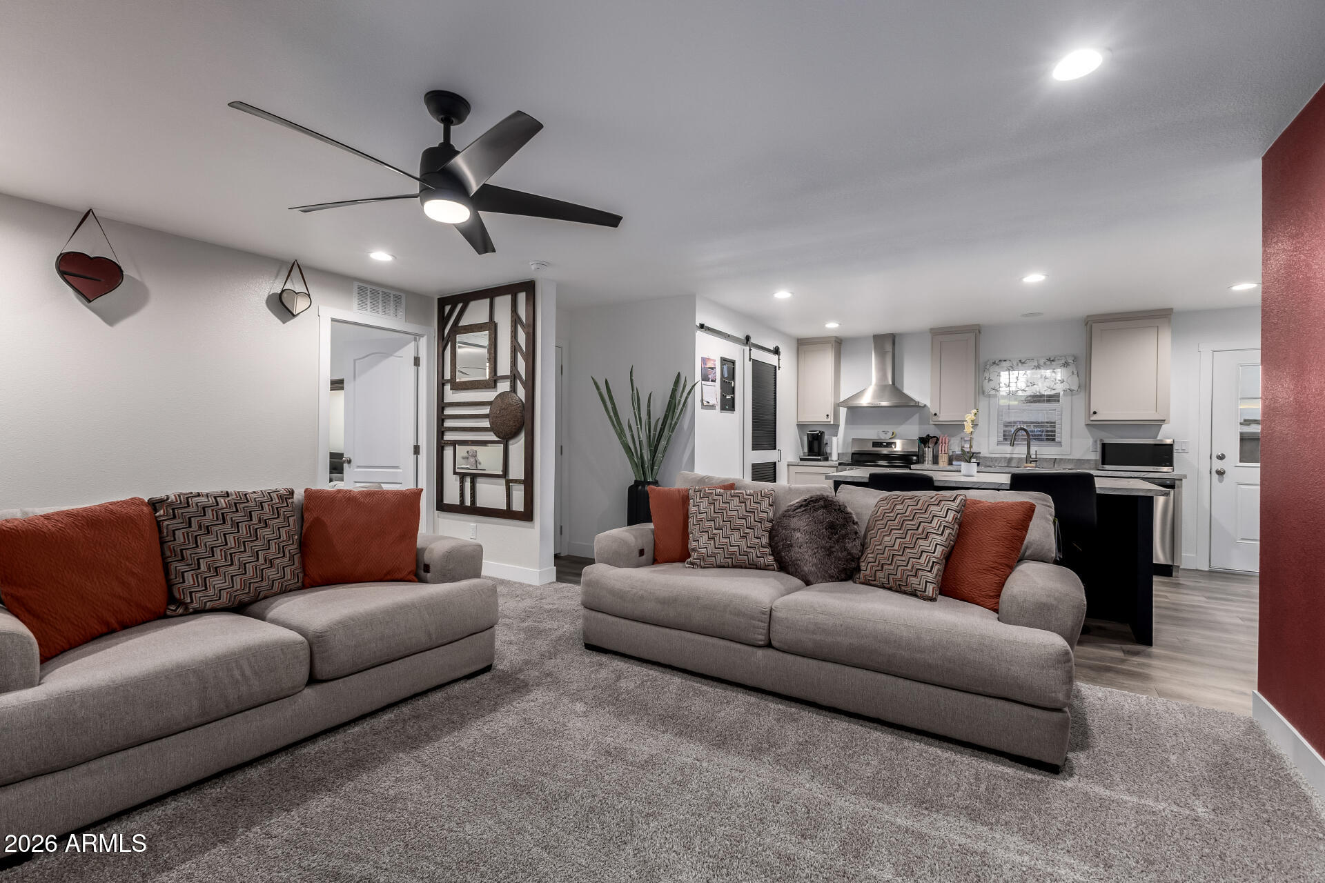 19401 North 7th Street, Unit 73 Phoenix, AZ 85024 - Photo 10 of 30 a living room with furniture and kitchen view