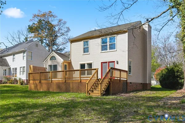 a view of a back yard of the house