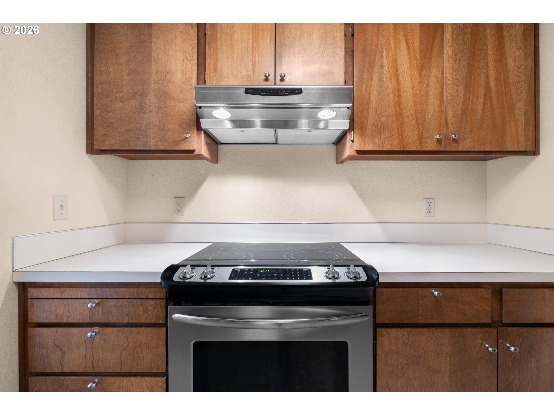 2239 Northeast 153rd Avenue Portland, OR 97230 - Photo 12 of 32 a stove top oven sitting inside of a kitchen
