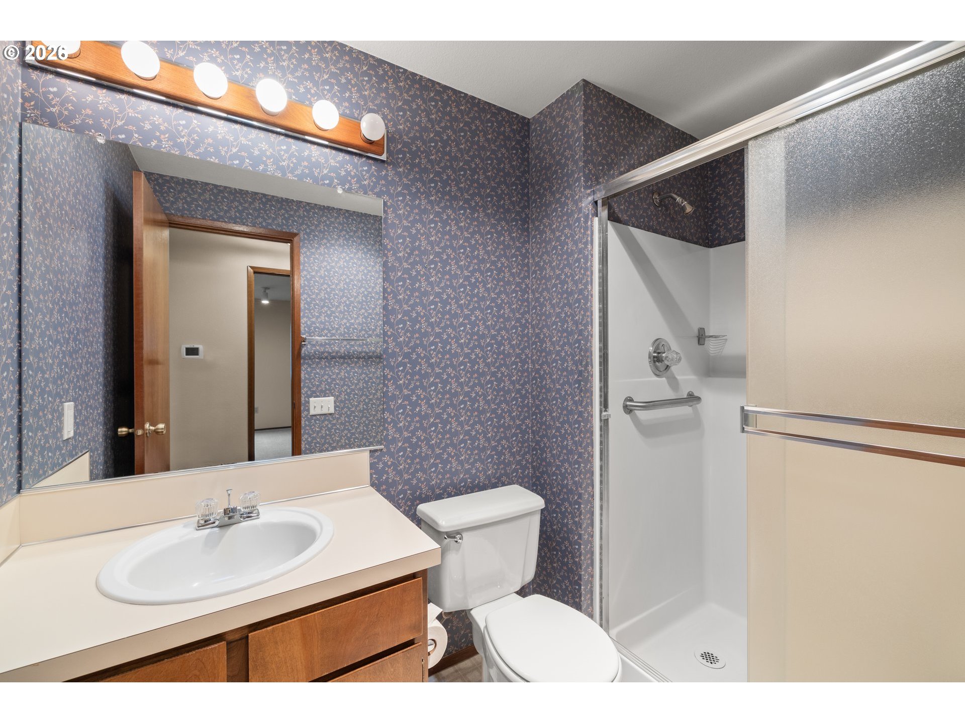 2239 Northeast 153rd Avenue Portland, OR 97230 - Photo 21 of 32 a bathroom with a sink and a mirror