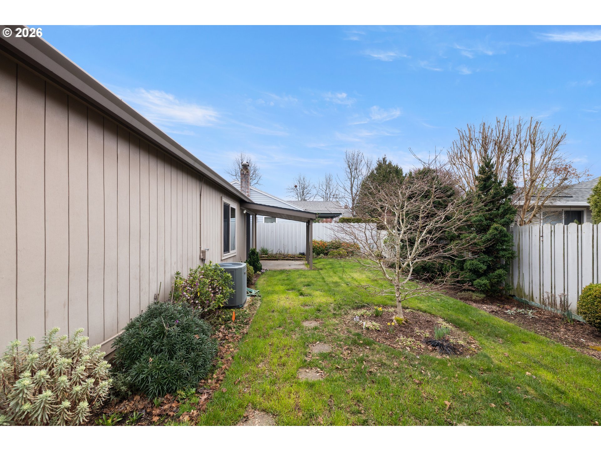 2239 Northeast 153rd Avenue Portland, OR 97230 - Photo 24 of 32 a backyard of a house with lots of green space
