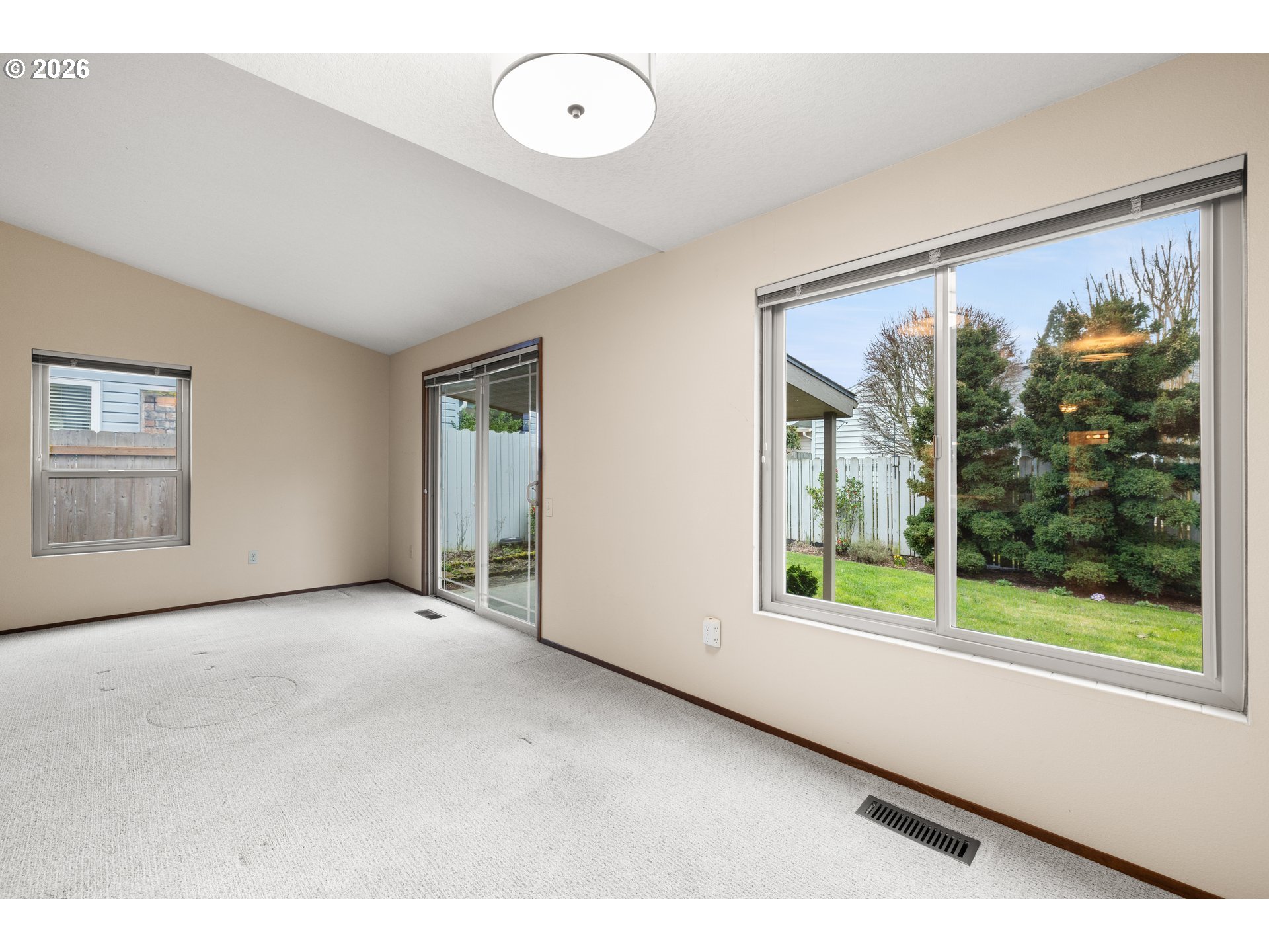 2239 Northeast 153rd Avenue Portland, OR 97230 - Photo 9 of 32 an empty room with windows