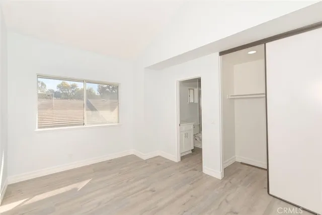 a bathroom with a sink mirror toilet and bathtub