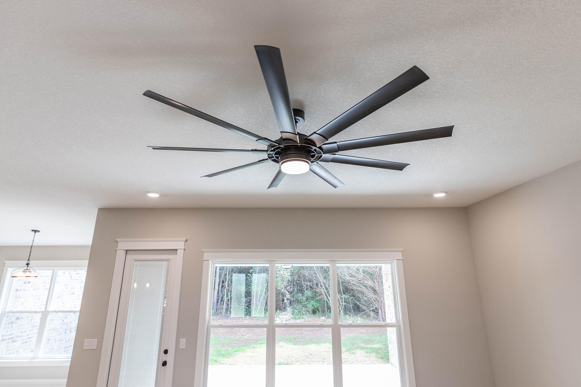 5155 Griffith Mill Road Holt, FL 32564 - Photo 14 of 56 a view of a livingroom with a ceiling fan and window