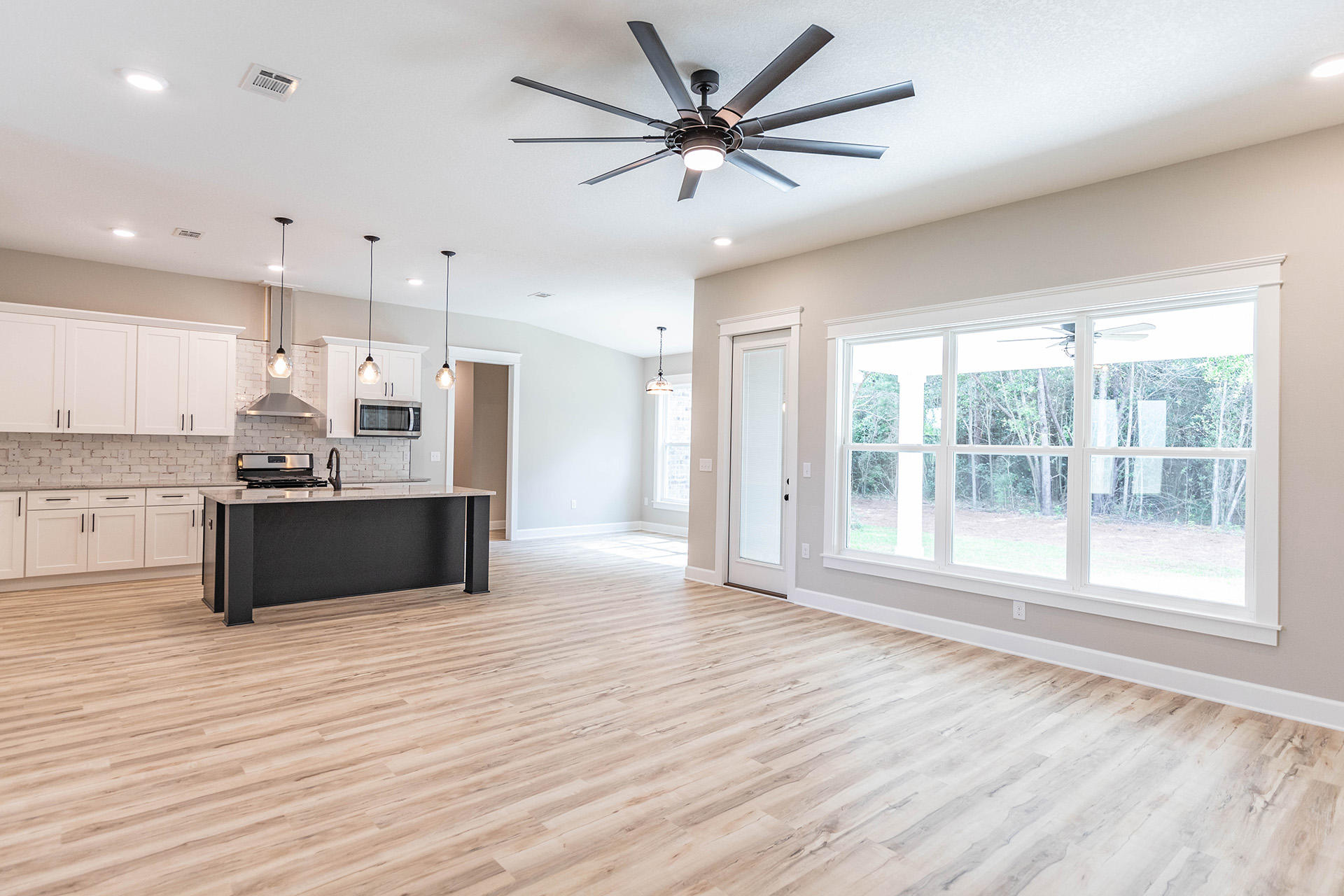 5155 Griffith Mill Road Holt, FL 32564 - Photo 15 of 56 a view of kitchen with granite countertop window and a sink