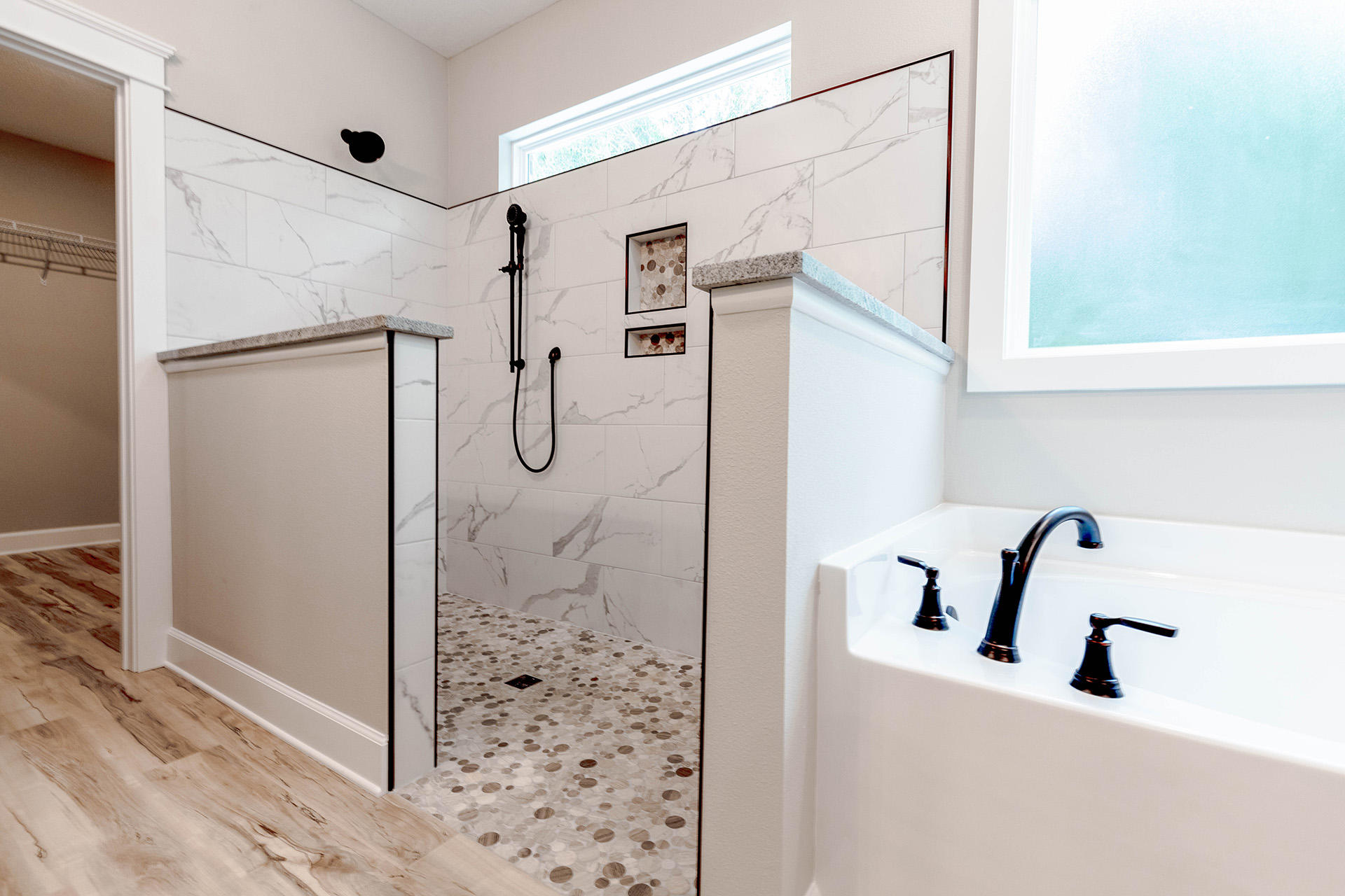 5155 Griffith Mill Road Holt, FL 32564 - Photo 32 of 56 a bathroom with a shower and a sink