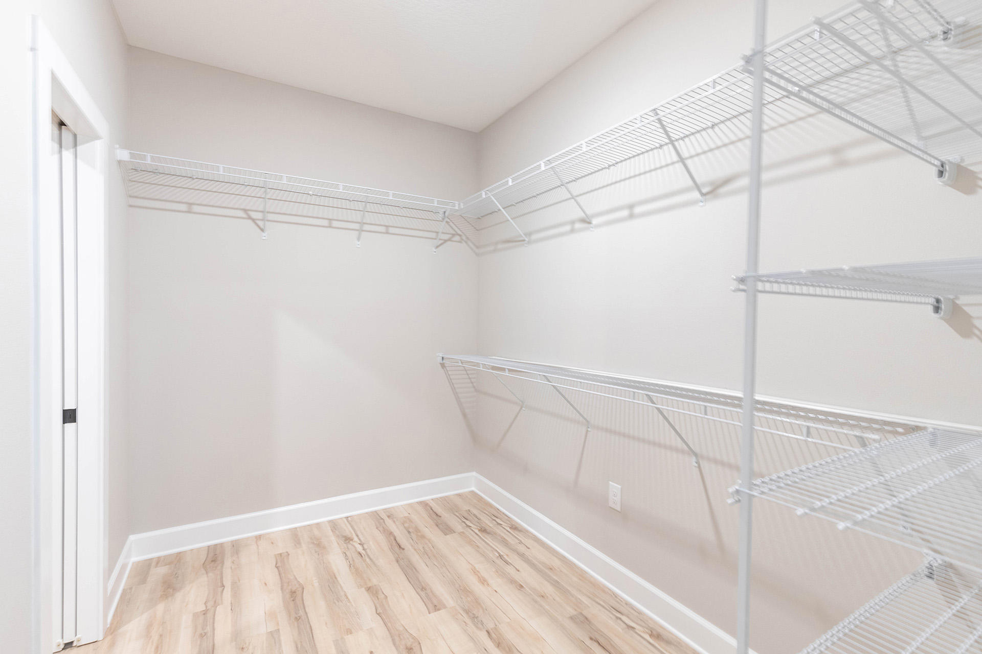 5155 Griffith Mill Road Holt, FL 32564 - Photo 38 of 56 a view of a room with racks on the wall