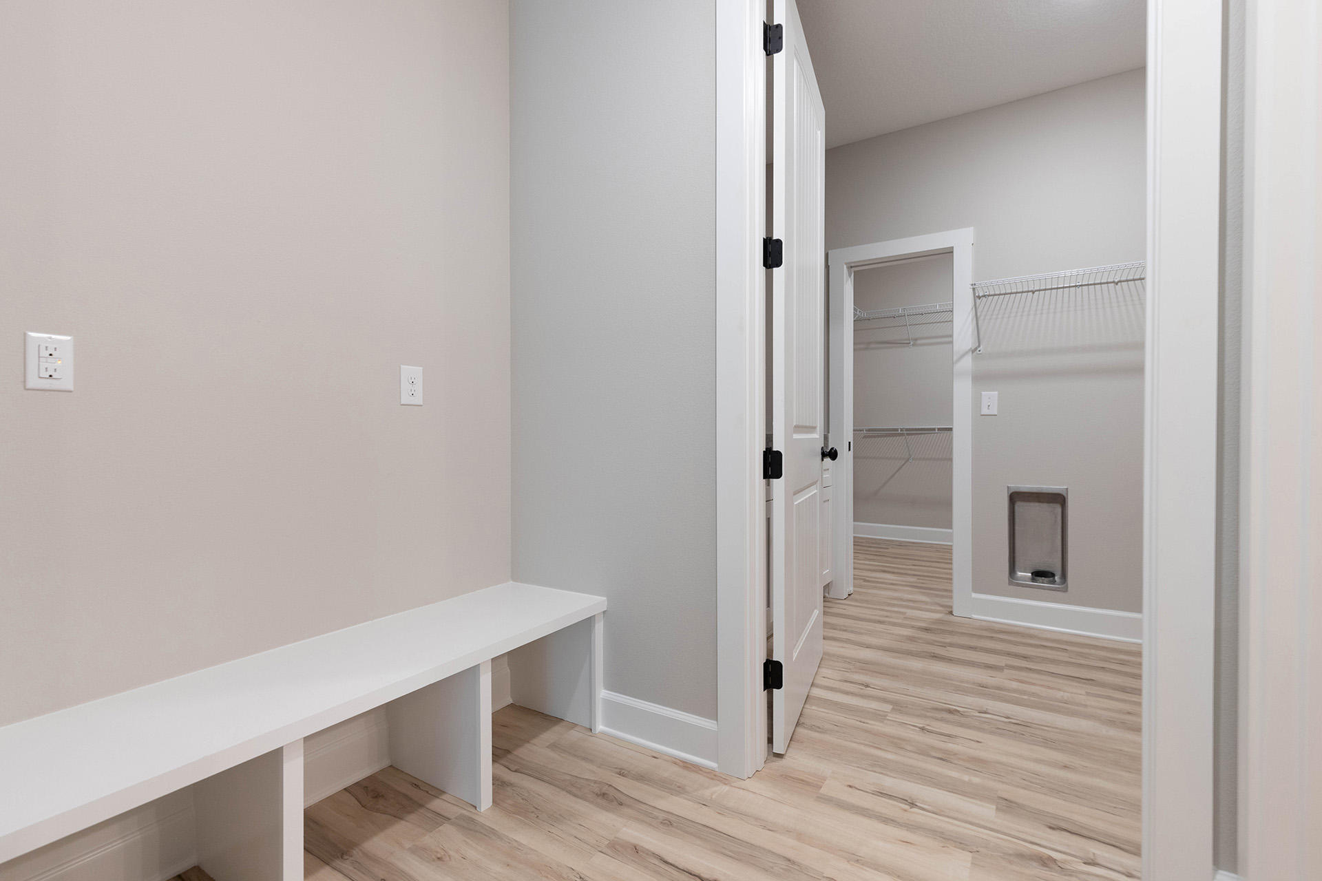 5155 Griffith Mill Road Holt, FL 32564 - Photo 40 of 56 a room with wooden floor and white walls