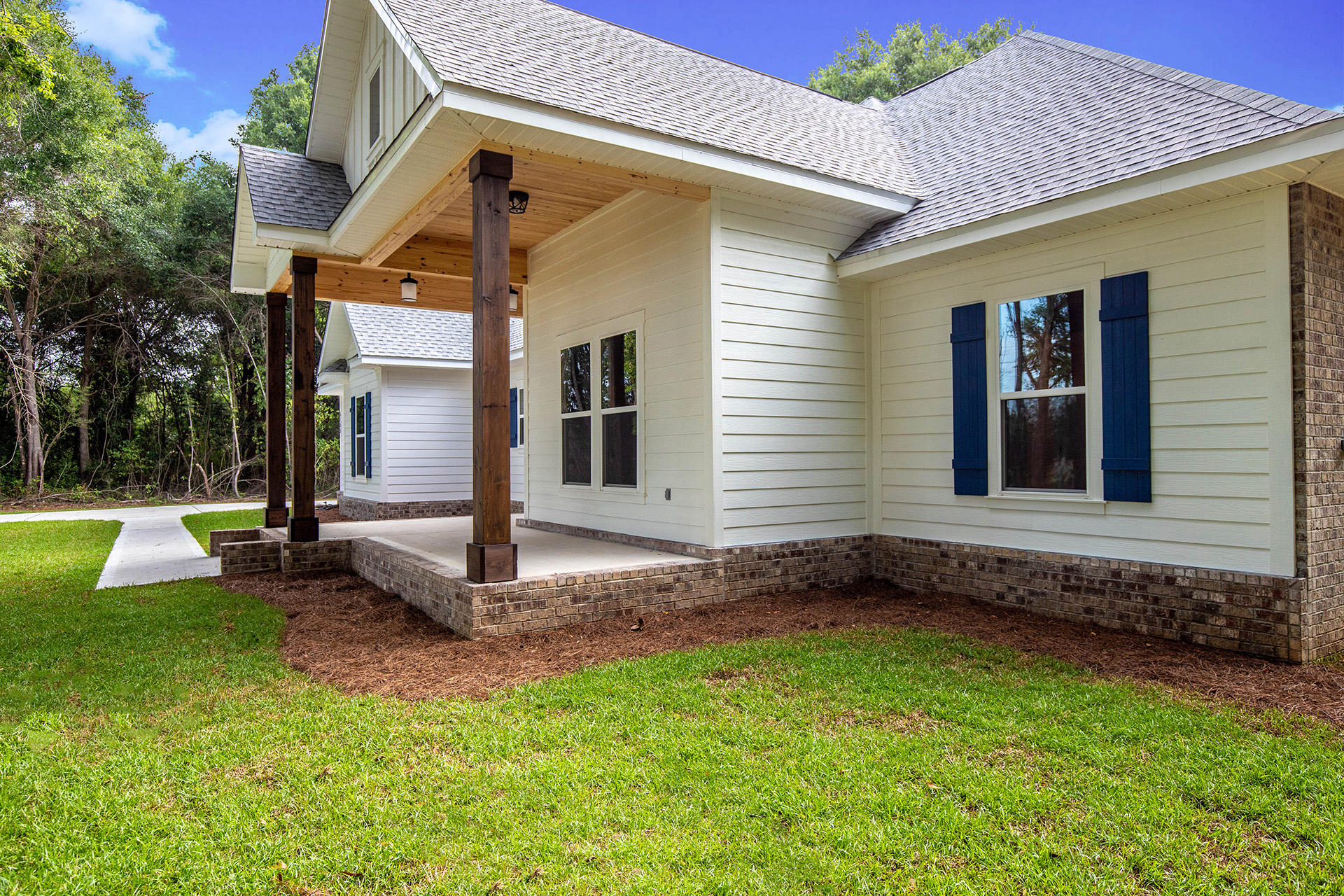 5155 Griffith Mill Road Holt, FL 32564 - Photo 6 of 56 a view of a backyard with a garden