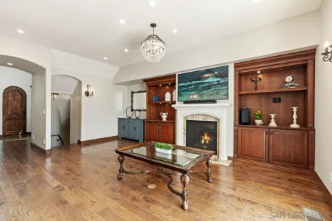 a outdoor living space with furniture and a fireplace